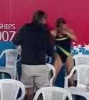 Father O'Way checks out one of the ultra slippery suits